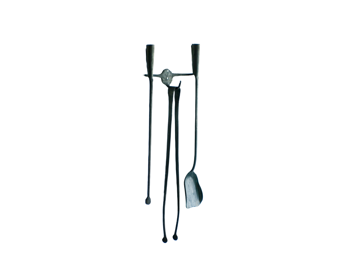 A FERRO E FUOCO . Fireplace tools with wall bracket